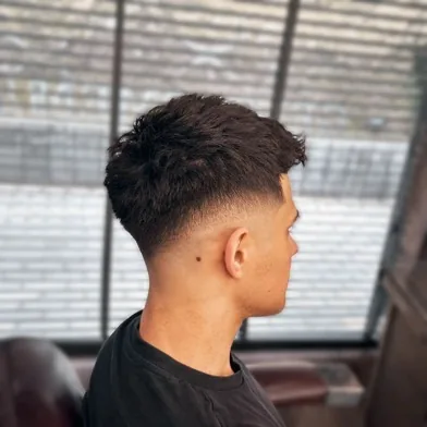 Curly fade chez Gentlemen Barber Shop Radom - réalisation barbier à Radom